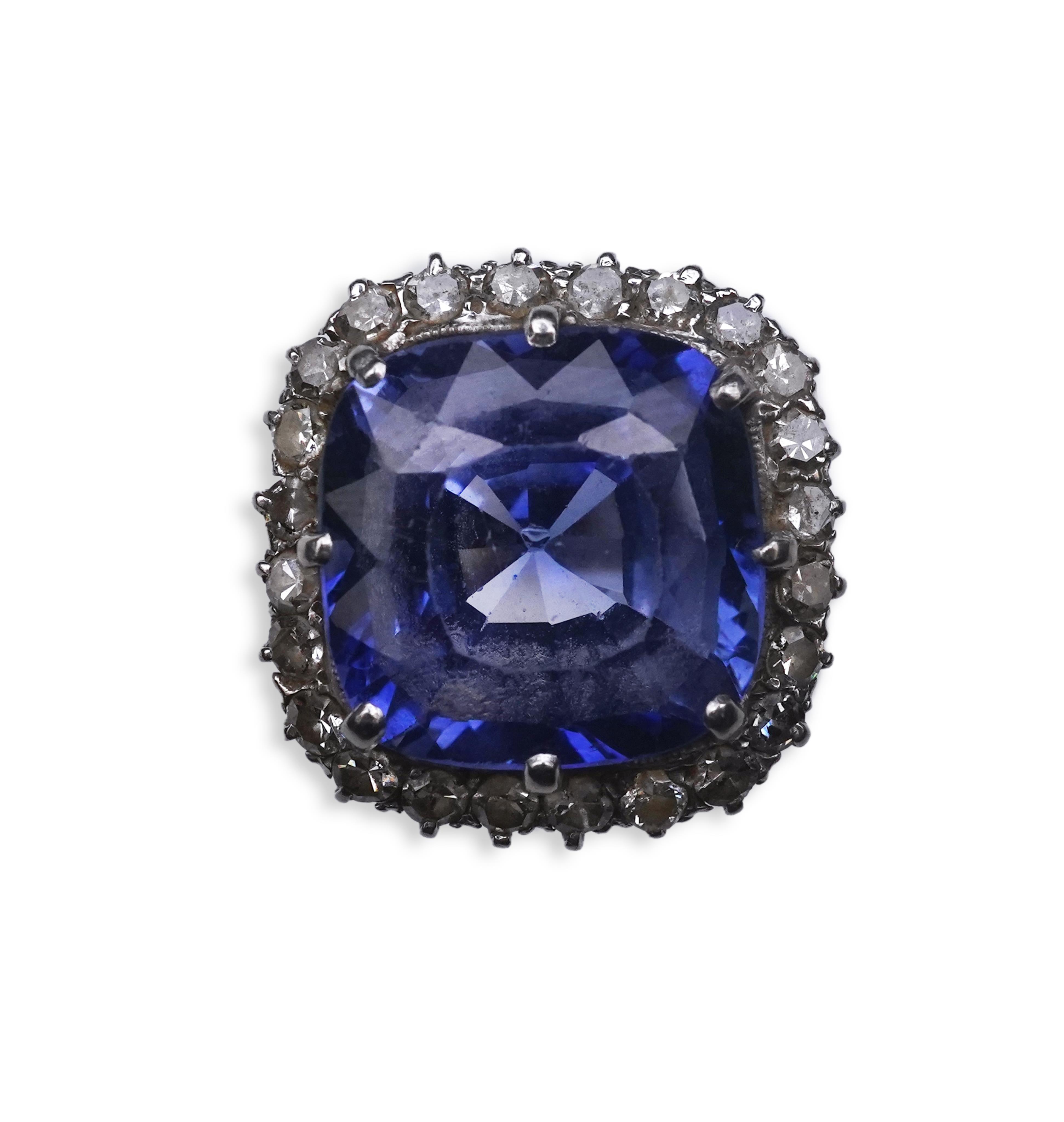 A synthetic sapphire and diamond cluster ring, early 20th century